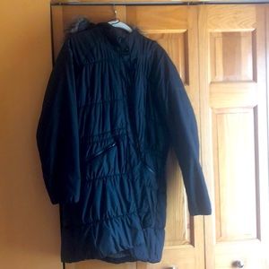 Black light weight Columbia winter jacket. Longer length large size.
